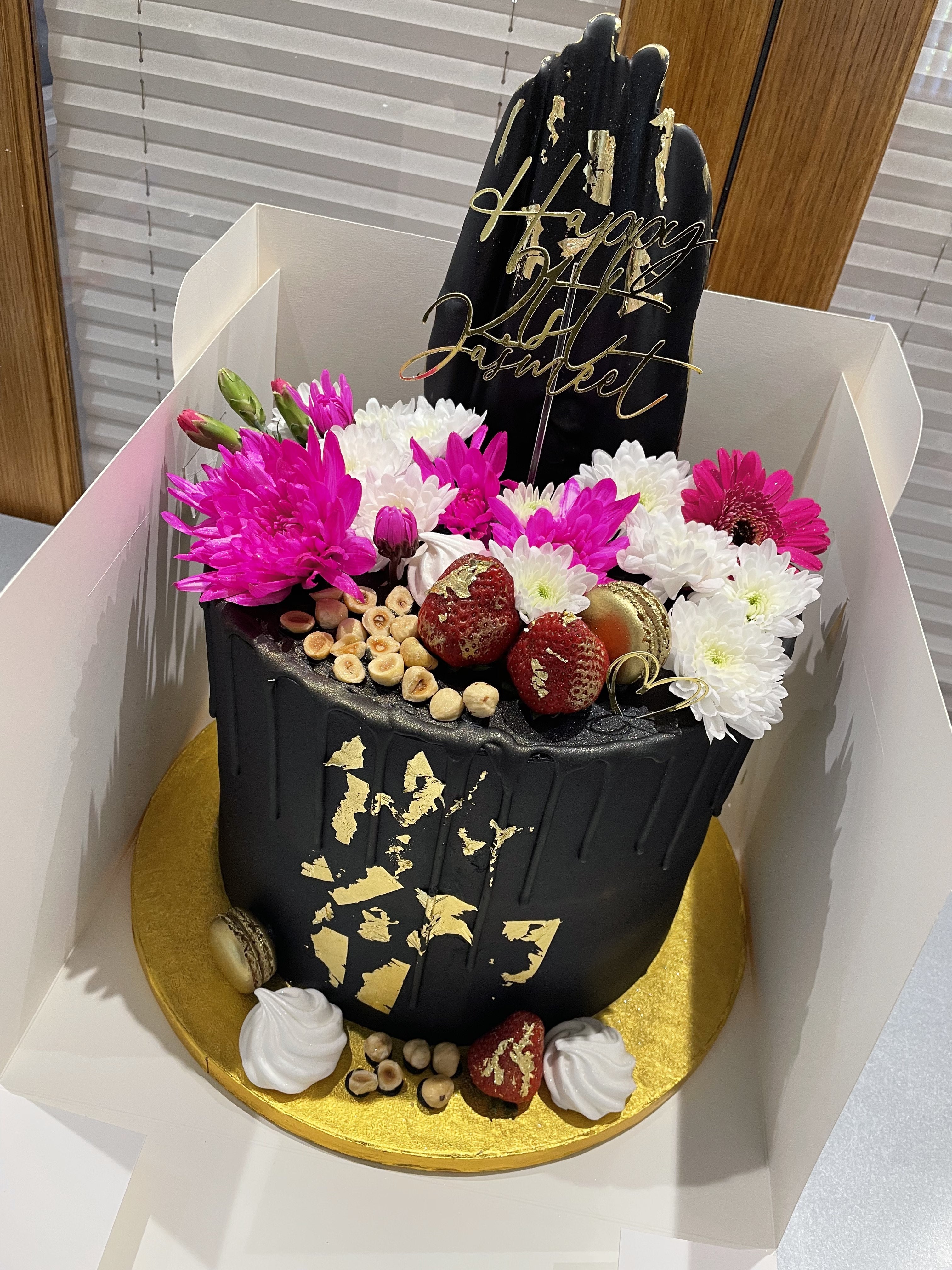 BLACK ELEGANCE FLORAL DRIP CAKE