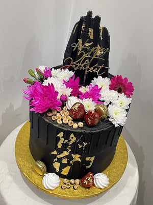 BLACK ELEGANCE FLORAL DRIP CAKE