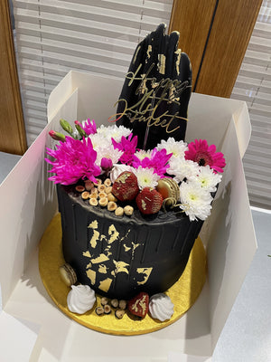 BLACK ELEGANCE FLORAL DRIP CAKE