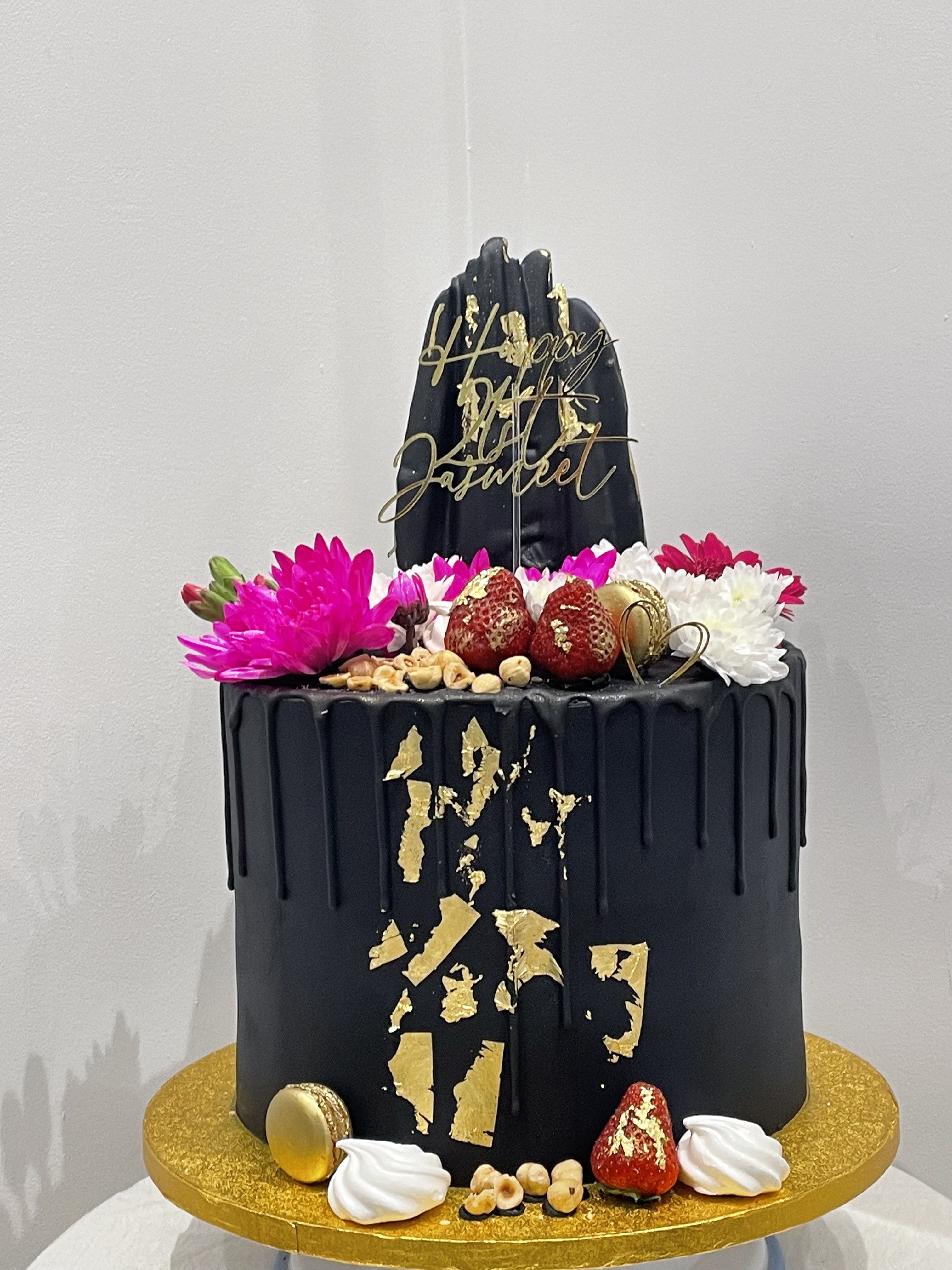 BLACK ELEGANCE FLORAL DRIP CAKE