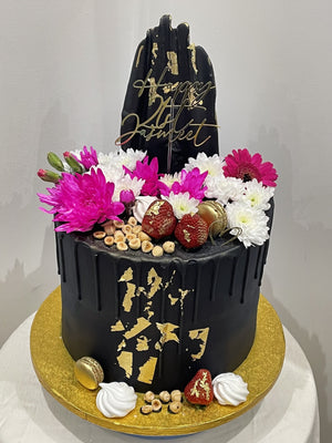 BLACK ELEGANCE FLORAL DRIP CAKE